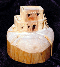 Pueblo Carved from Log, each one unique, the log determines the pueblo